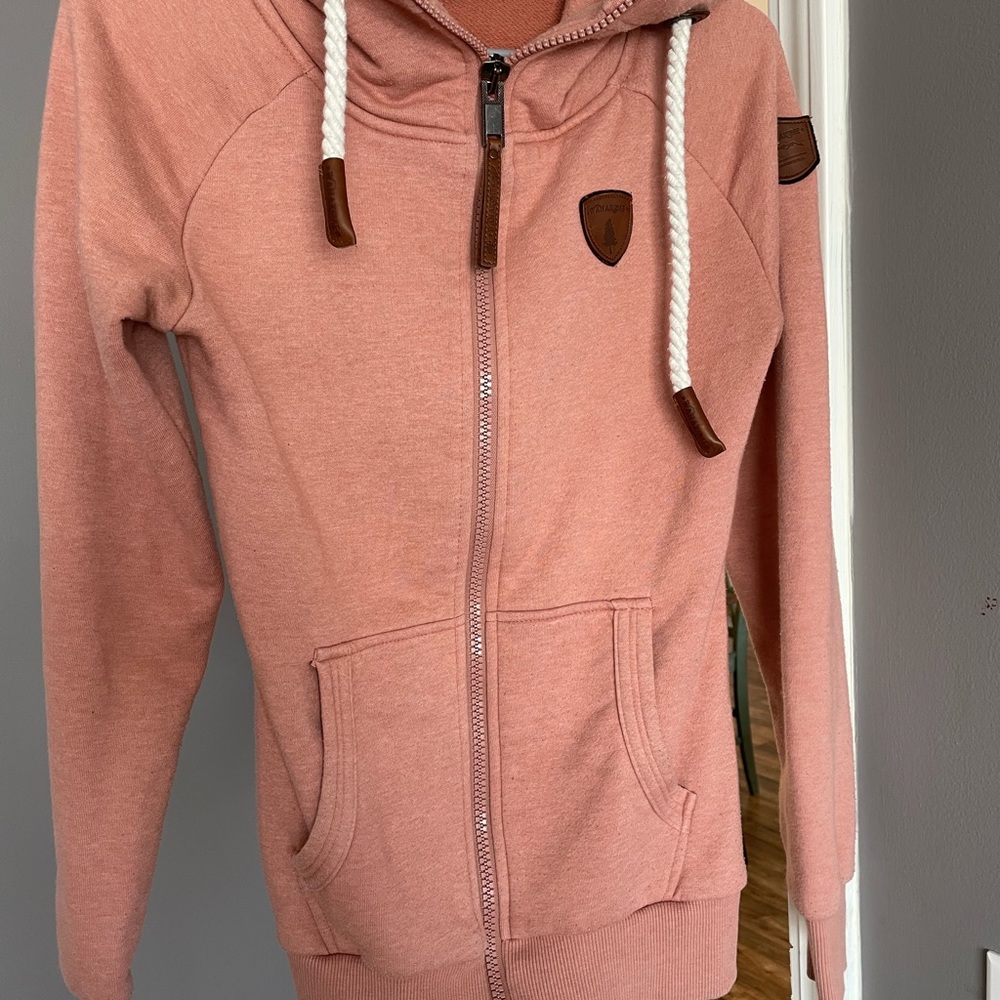 Wanakome brand zip up hoodie from buckle.